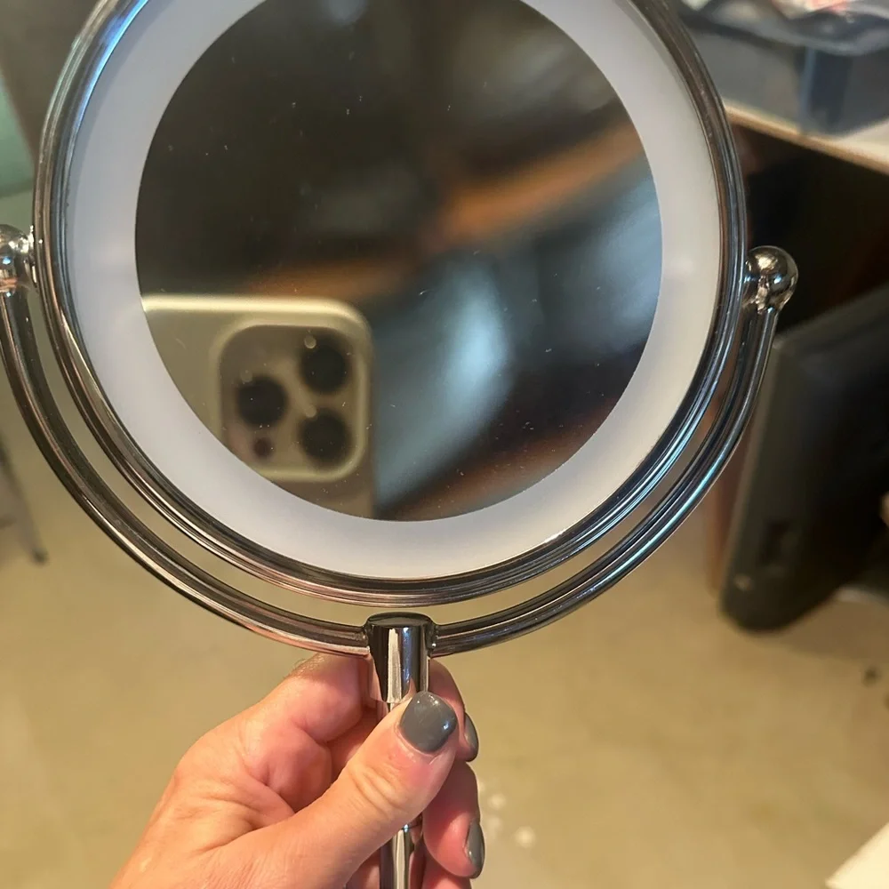 Conair double sided mirror w light.